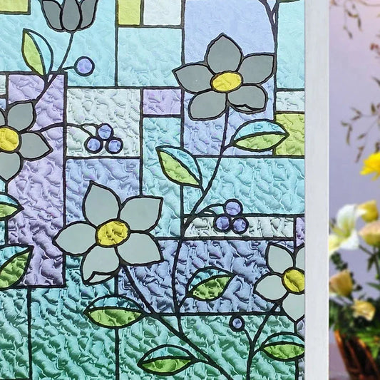 Fönsterdekor med turkosa blommor
