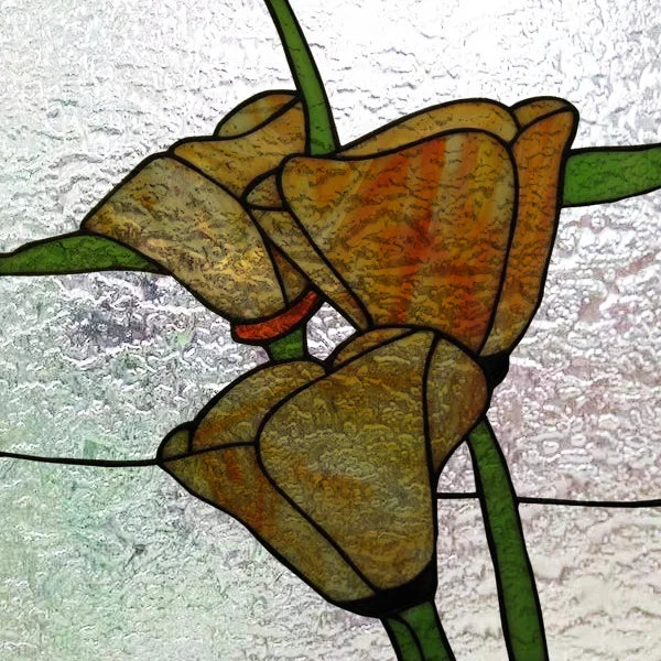 Fönsterfilm med gyllene blommotiv