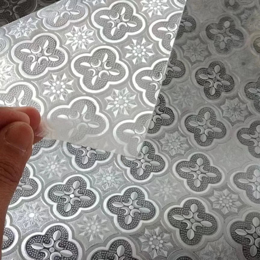 Fönsterfilm med ornamentmönster